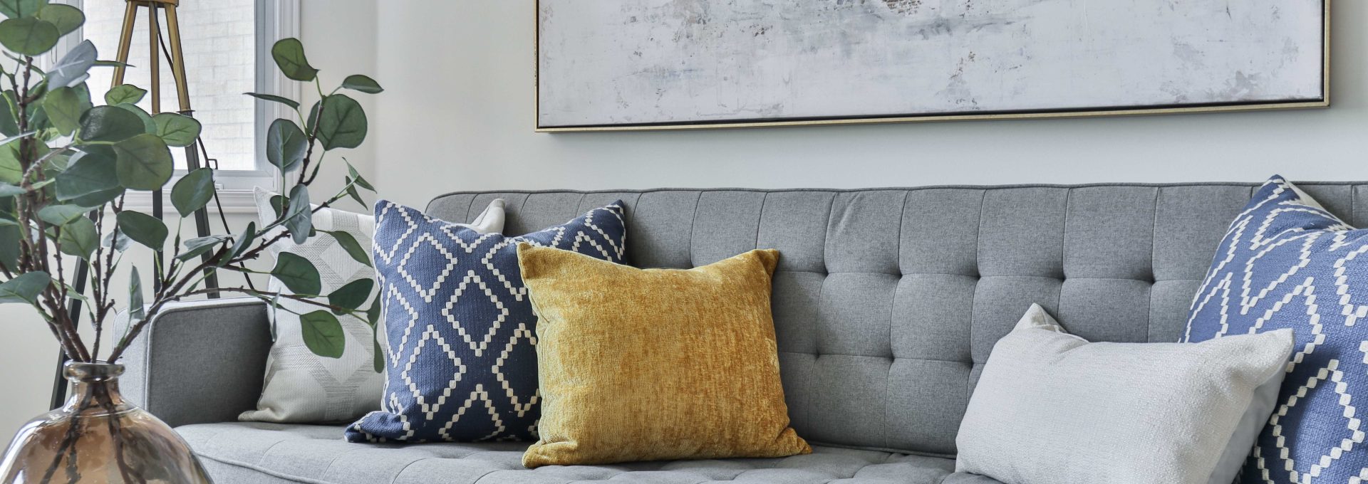 white and gray floral sofa